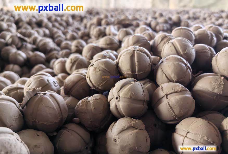 How are inert ceramic balls produced